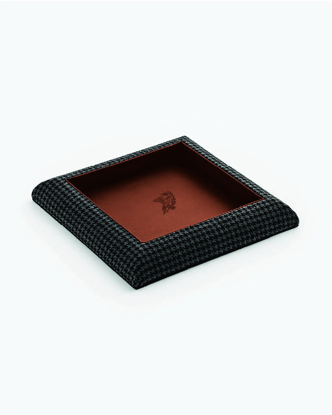 Catch Tray in tonal black houndstooth with Cognac leather lining, angled view